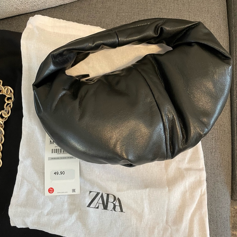 Black faux leather shoulder purse.